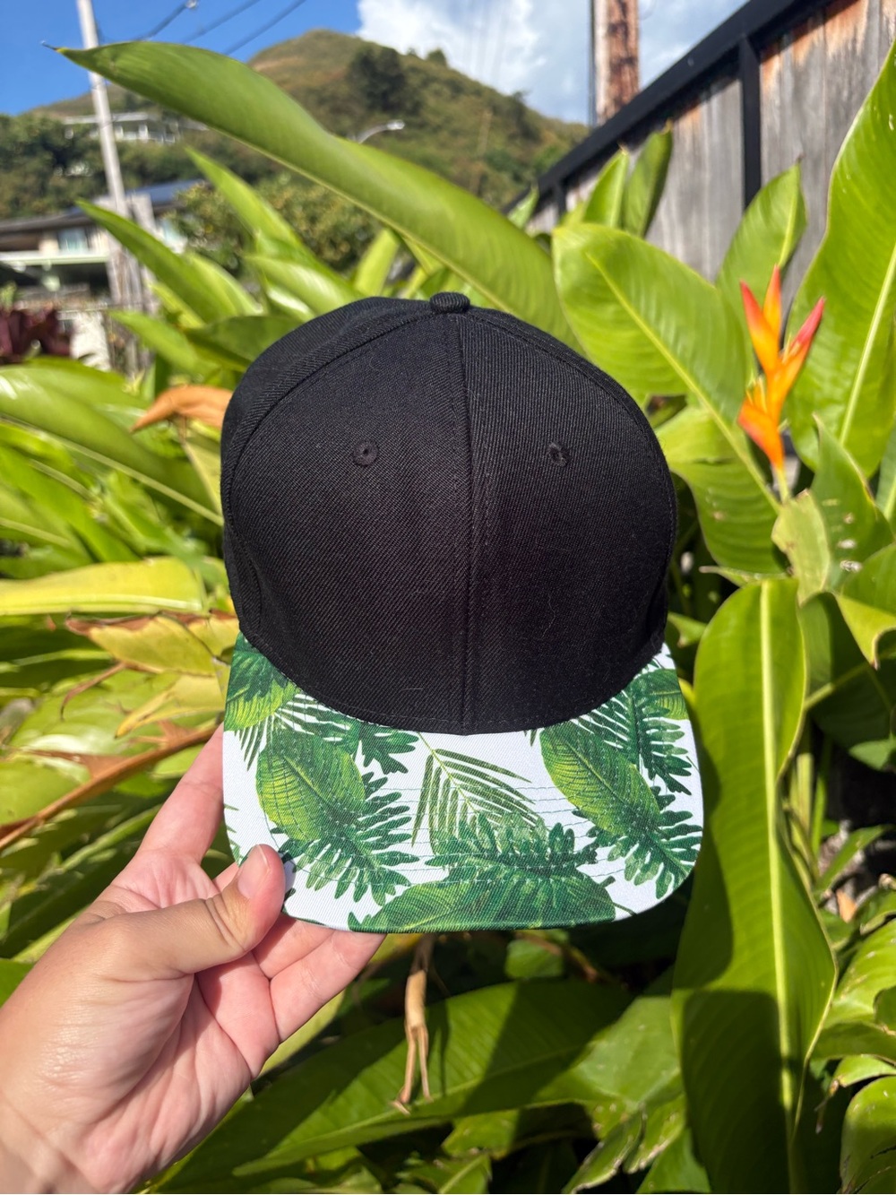 Black Snapback Hat with Tropical Green Leaf Brim